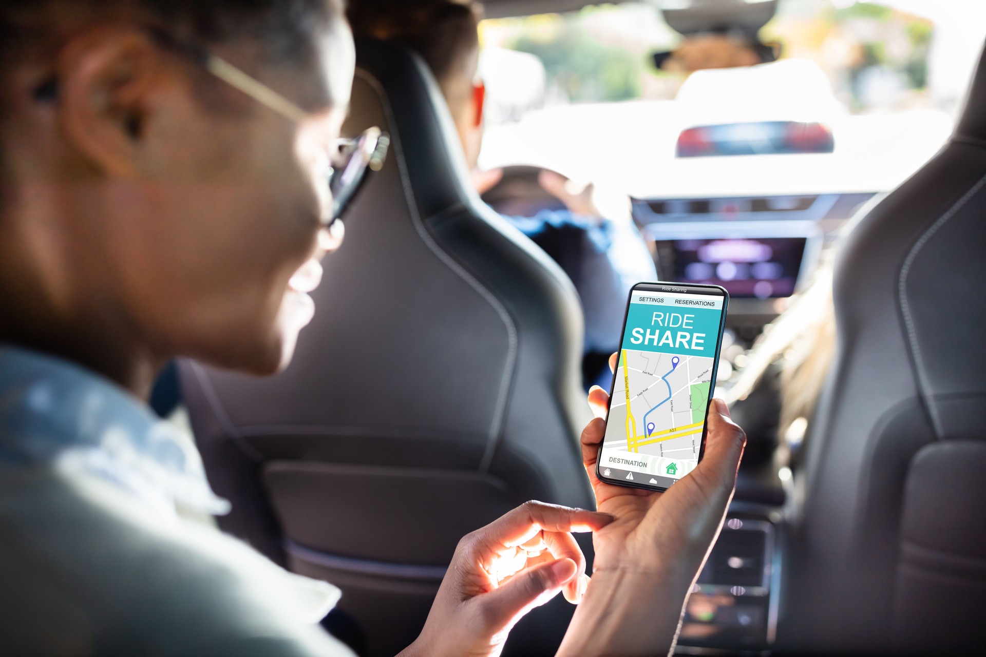 Woman Using Car Sharing App